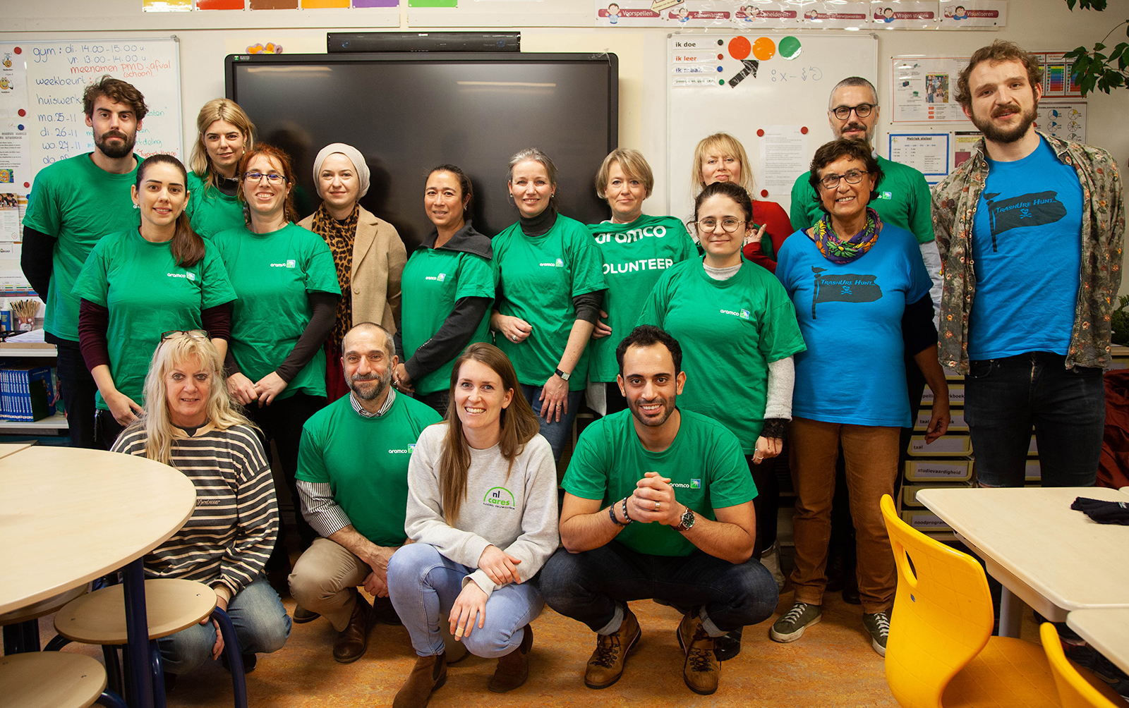 Group photo of Aramco volunteers alongside team members from NL Cares and OBS Springbok School