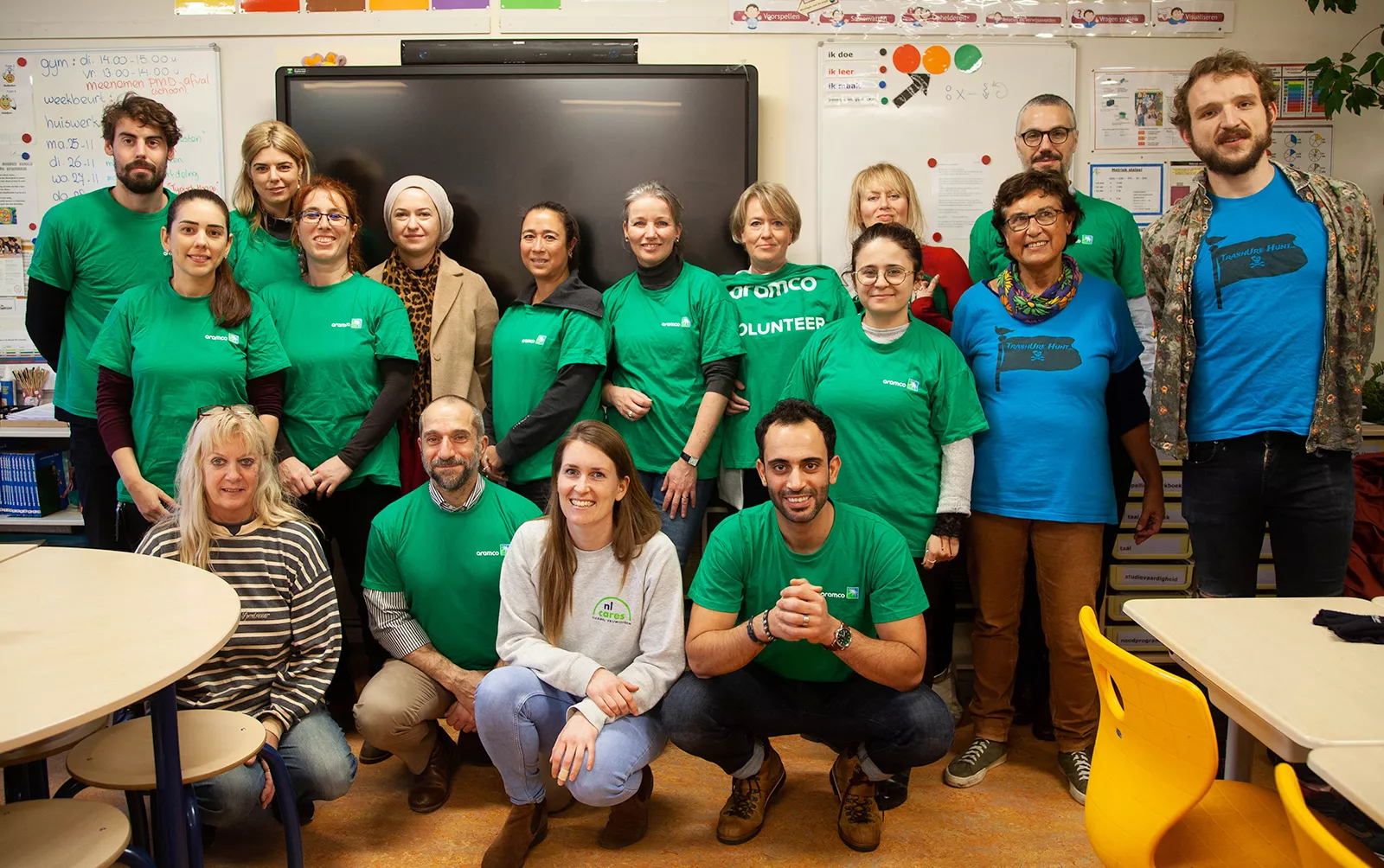 Group photo of Aramco volunteers alongside team members from NL Cares and OBS Springbok School