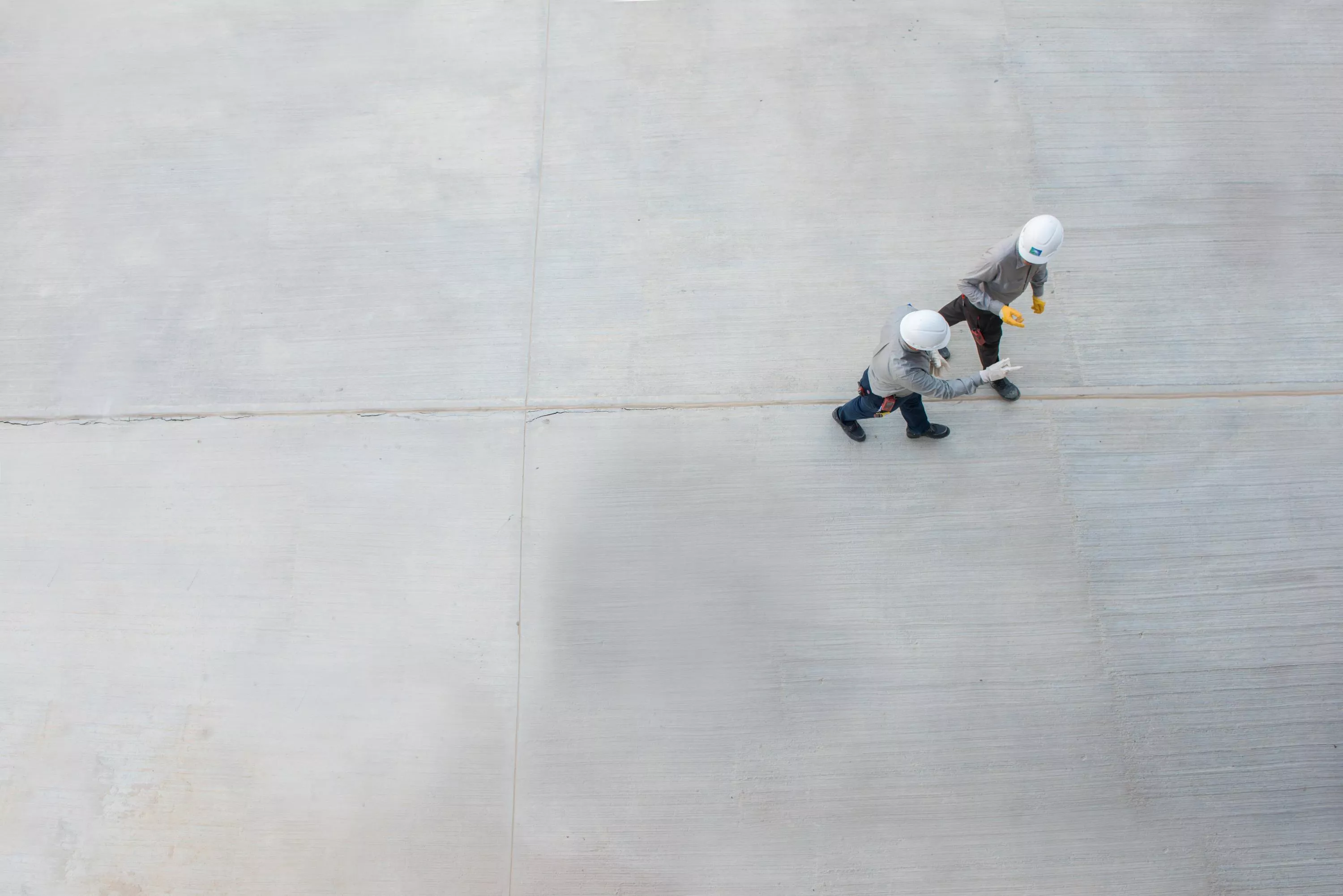 Aramco engineers walking and talking to each other